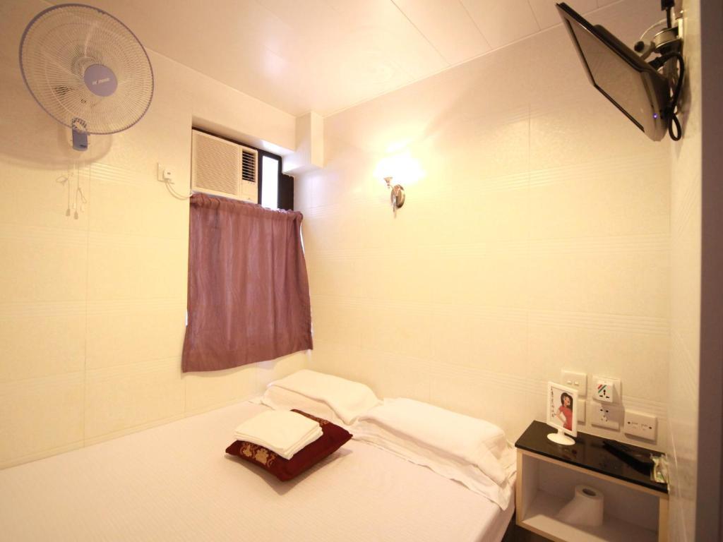 Cynthia'S Inn Kowloon Stadt Zimmer foto